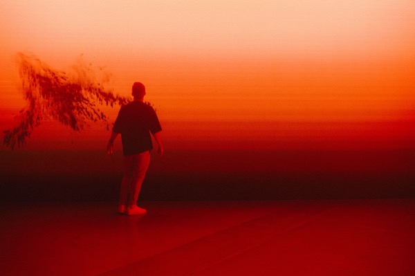 Exhibizz immersive space with visitors silhouetted against LED wall