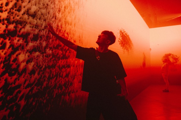 Exhibizz visitors interacting with responsive LED installation