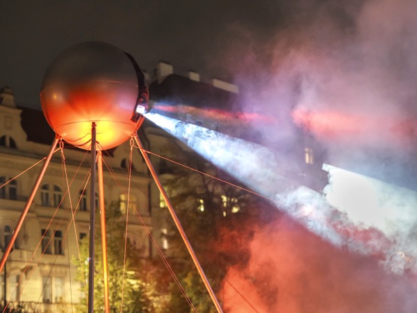 OKO installation night view with projected patterns on surroundings