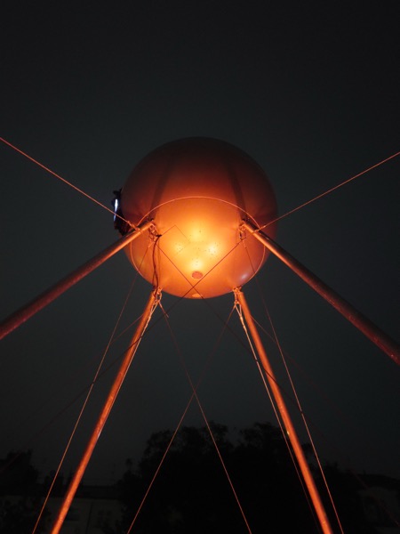 OKO robotic eye projecting distorted vision onto trees at Signal Festival