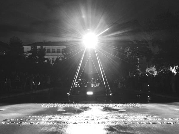 OKO projection beam visible in dark environment