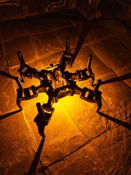 System robots interacting with light sensors in exhibition