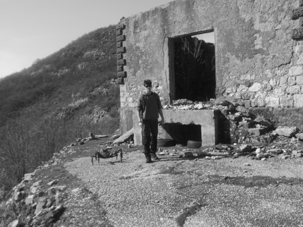 Host Guest robot in dark space with glowing optical fibers