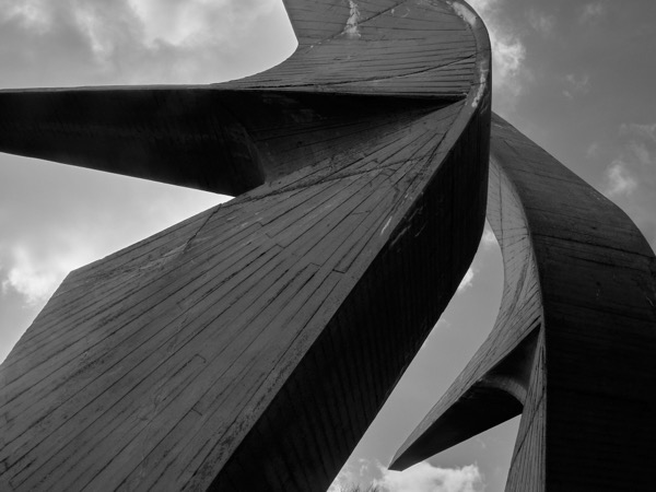Brutalist monument detail with sweeping concrete forms